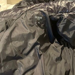 Black guess puffer jacket. Brand new. Price negotiable